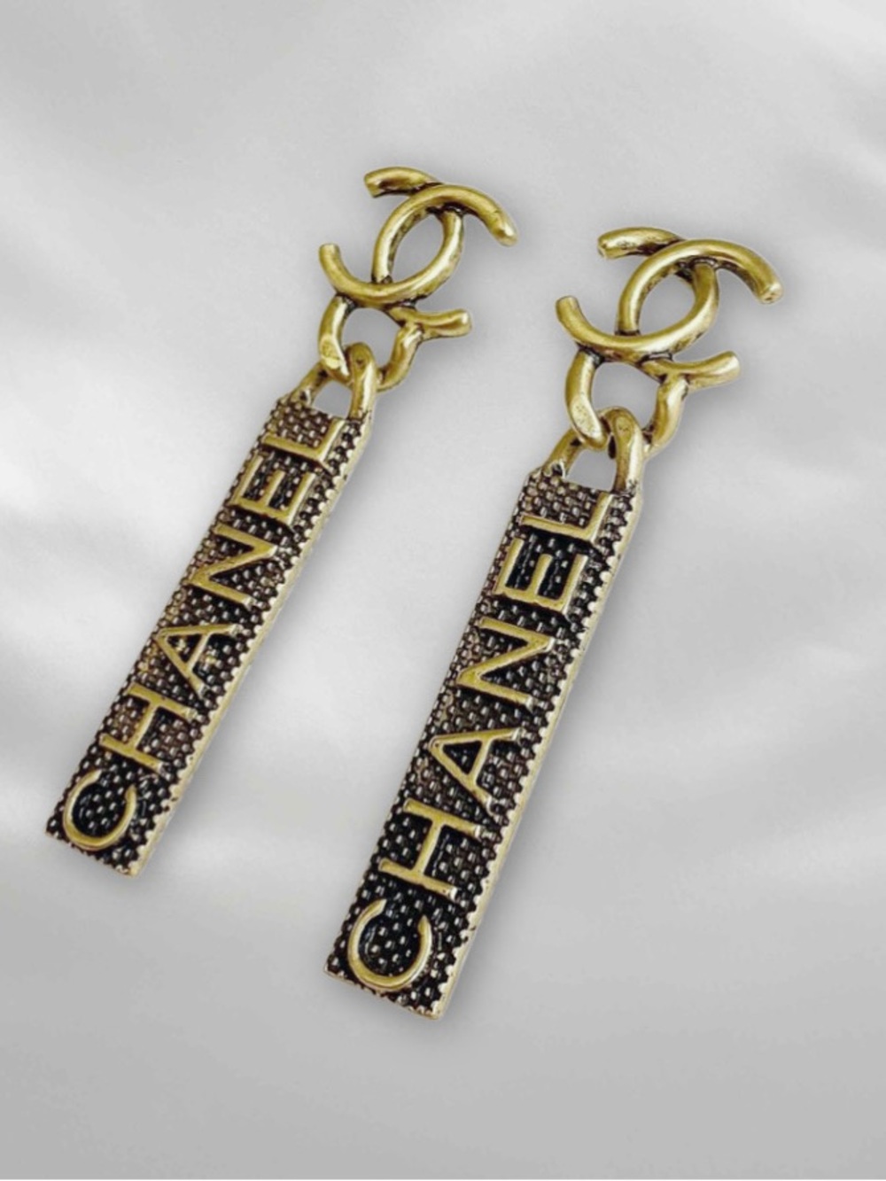 Antiqued gold CC-Inspired Gold Tone Black Logo Drop Earrings